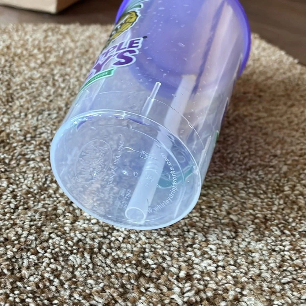 Pineapple Willy’s plastic cup with straw